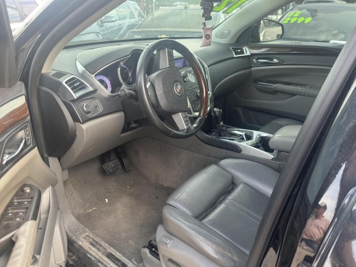 2012 BLACK CADILLAC SRX Luxury (3GYFNAE34CS) with an 3.6L V6 DOHC 24V FFV engine, AUTOMATIC transmission, located at 2303 West Mt. Houston, Houston, 77038, (281) 507-3956, 29.771597, -95.339569 - Photo#2
