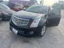 2012 BLACK CADILLAC SRX Luxury (3GYFNAE34CS) with an 3.6L V6 DOHC 24V FFV engine, AUTOMATIC transmission, located at 2303 West Mt. Houston, Houston, 77038, (281) 507-3956, 29.771597, -95.339569 - Photo#3