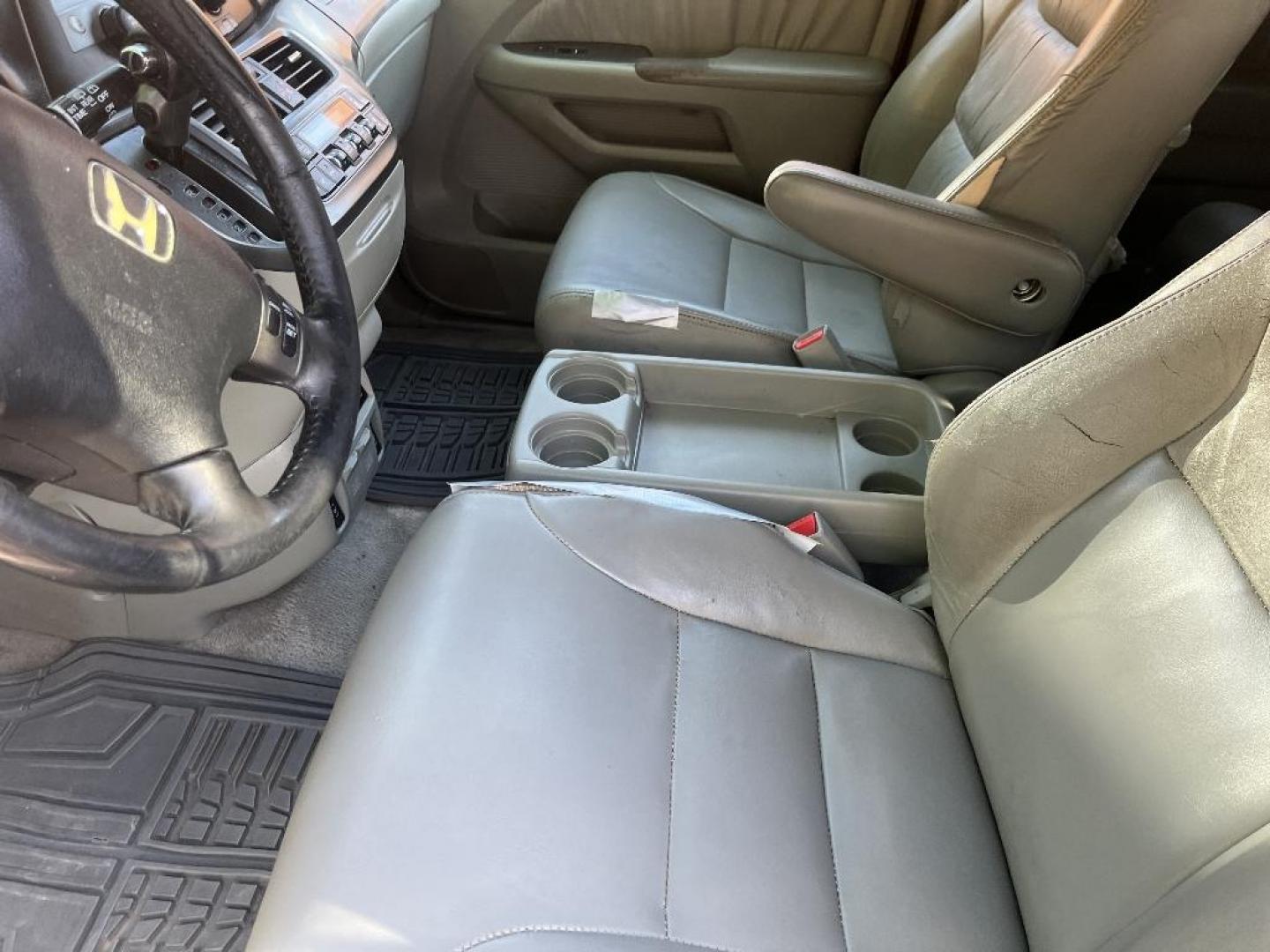 2007 BROWN HONDA ODYSSEY EX-L w/ DVD and Navigation (5FNRL38737B) with an 3.5L V6 SOHC 24V engine, AUTOMATIC transmission, located at 2303 West Mt. Houston, Houston, 77038, (281) 507-3956, 29.771597, -95.339569 - Photo#1