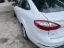 2014 WHITE FORD FIESTA SE Sedan (3FADP4BJ2EM) with an 1.6L L4 DOHC 16V engine, AUTOMATIC transmission, located at 2303 West Mt. Houston, Houston, 77038, (281) 507-3956, 29.771597, -95.339569 - Photo#4