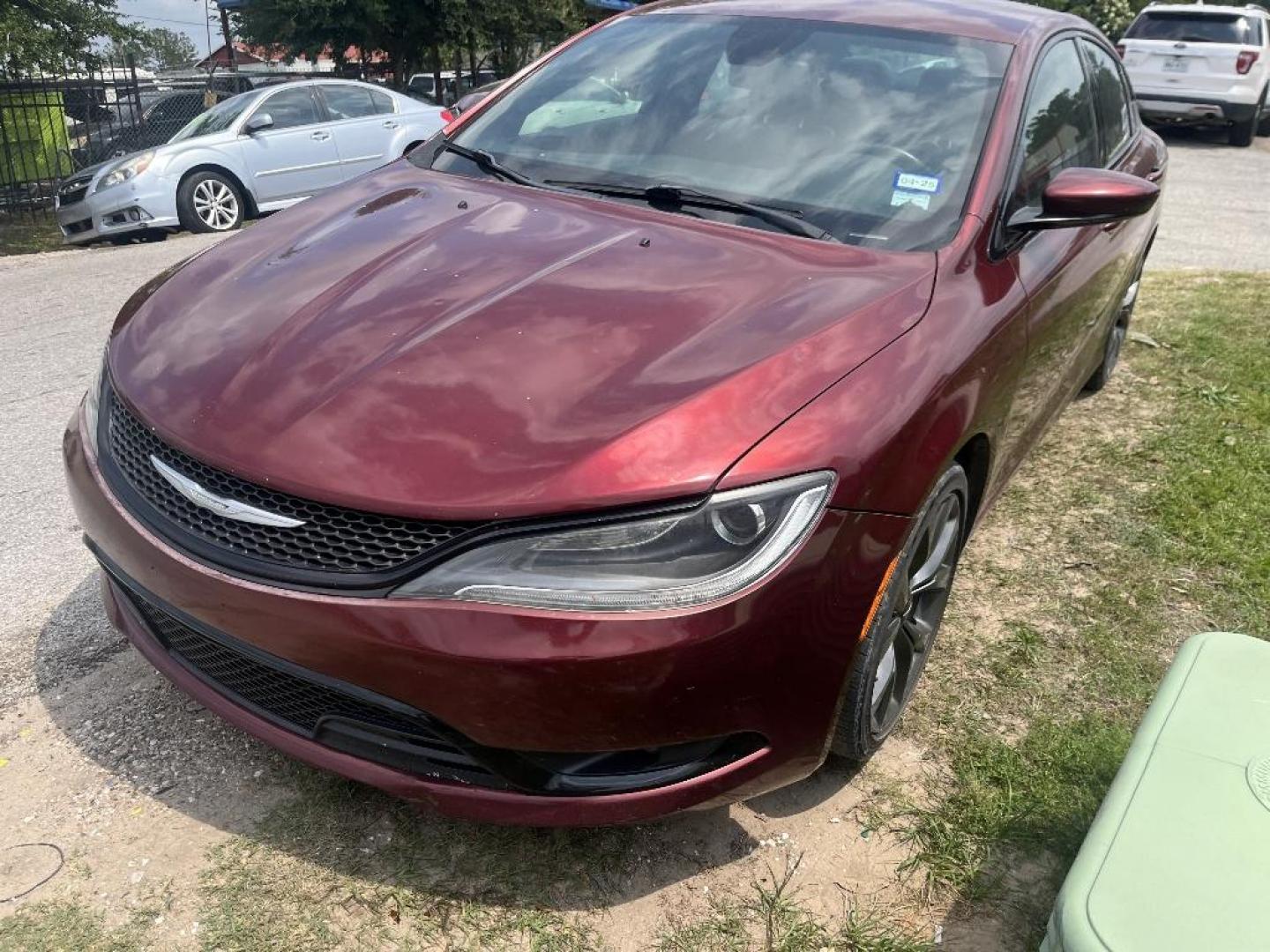 2015 RED CHRYSLER 200 S (1C3CCCBG2FN) with an 3.6L V6 DOHC 24V FFV engine, AUTOMATIC transmission, located at 2303 West Mt. Houston, Houston, 77038, (281) 507-3956, 29.771597, -95.339569 - Photo#6