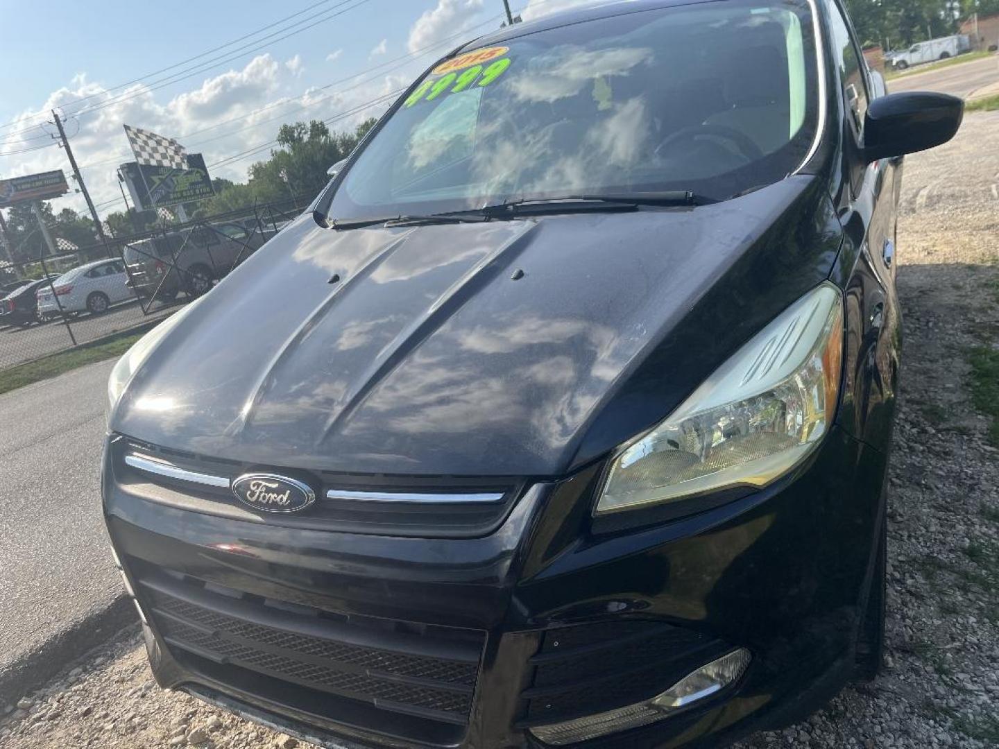 2015 BLACK FORD ESCAPE SE FWD (1FMCU0GX0FU) with an 1.6L L4 DOHC 16V engine, AUTOMATIC transmission, located at 2303 West Mt. Houston, Houston, 77038, (281) 507-3956, 29.771597, -95.339569 - Photo#2
