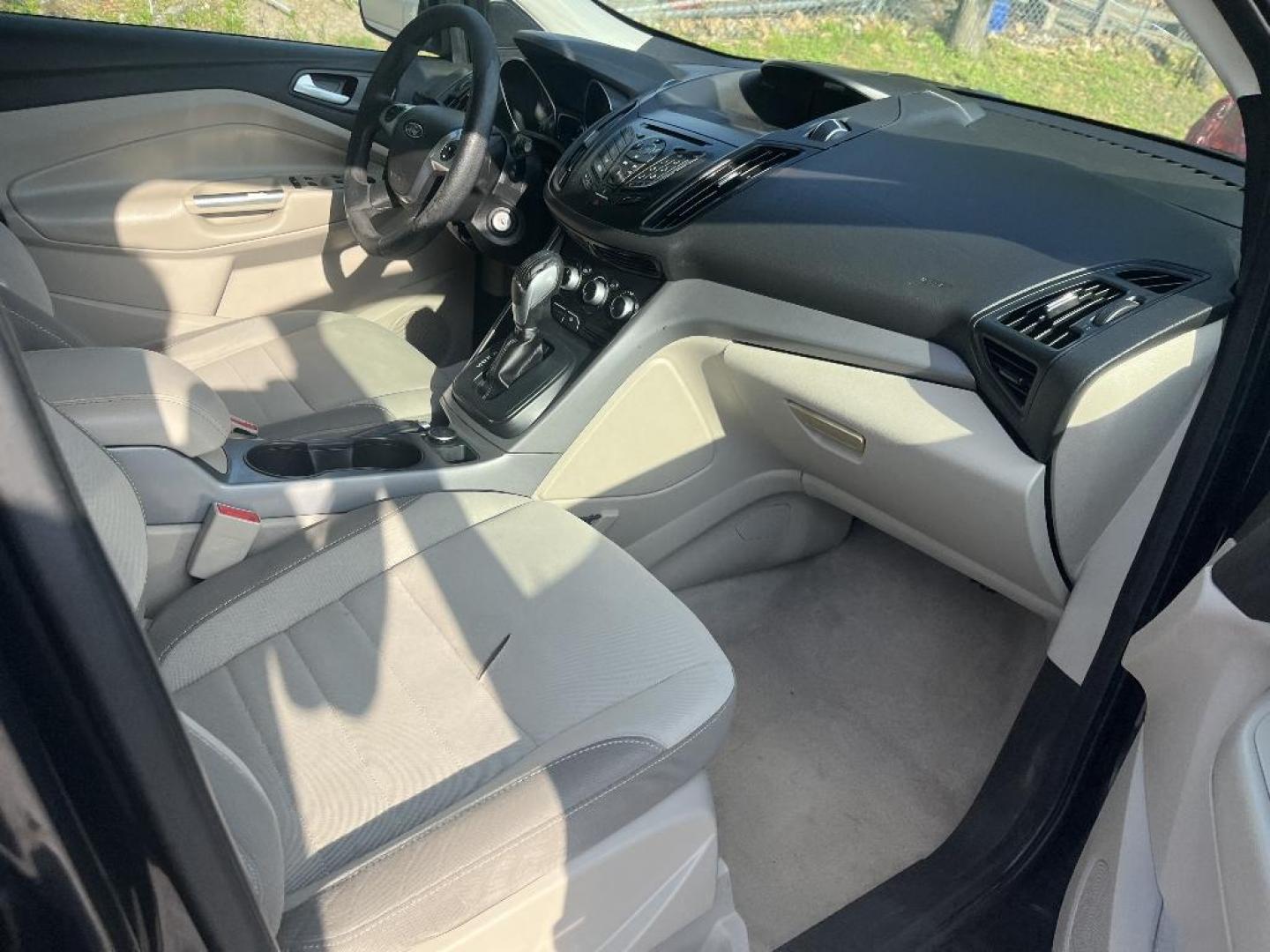 2015 BLACK FORD ESCAPE SE FWD (1FMCU0GX0FU) with an 1.6L L4 DOHC 16V engine, AUTOMATIC transmission, located at 2303 West Mt. Houston, Houston, 77038, (281) 507-3956, 29.771597, -95.339569 - Photo#3