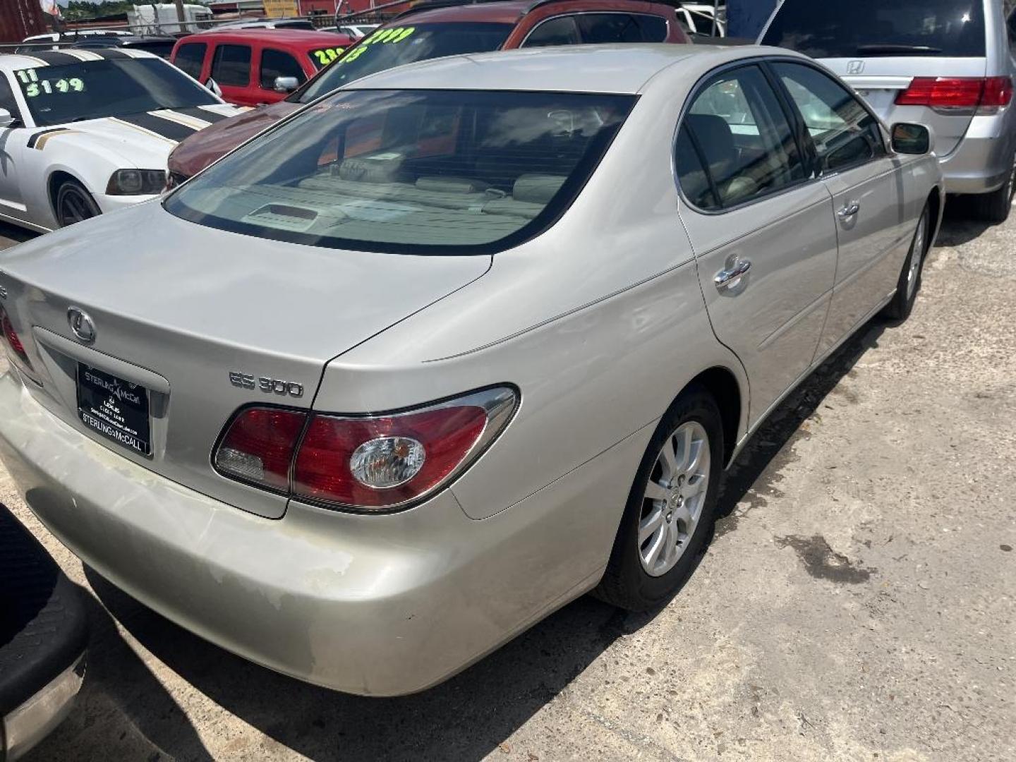 2002 BROWN LEXUS ES 300 Sedan (JTHBF30G620) with an 3.0L V6 DOHC 24V engine, AUTOMATIC transmission, located at 2303 West Mt. Houston, Houston, 77038, (281) 507-3956, 29.771597, -95.339569 - Photo#1