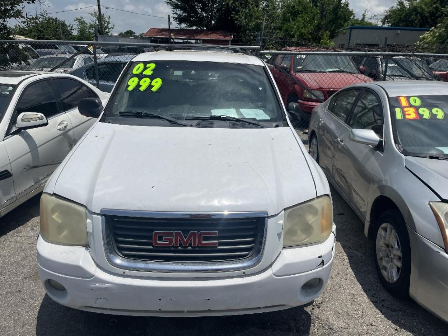 2002 WHITE GMC ENVOY SLE 2WD (1GKDS13S922) with an 4.2L L6 DOHC 24V engine, AUTOMATIC transmission, located at 2303 West Mt. Houston, Houston, 77038, (281) 507-3956, 29.771597, -95.339569 - Photo#0