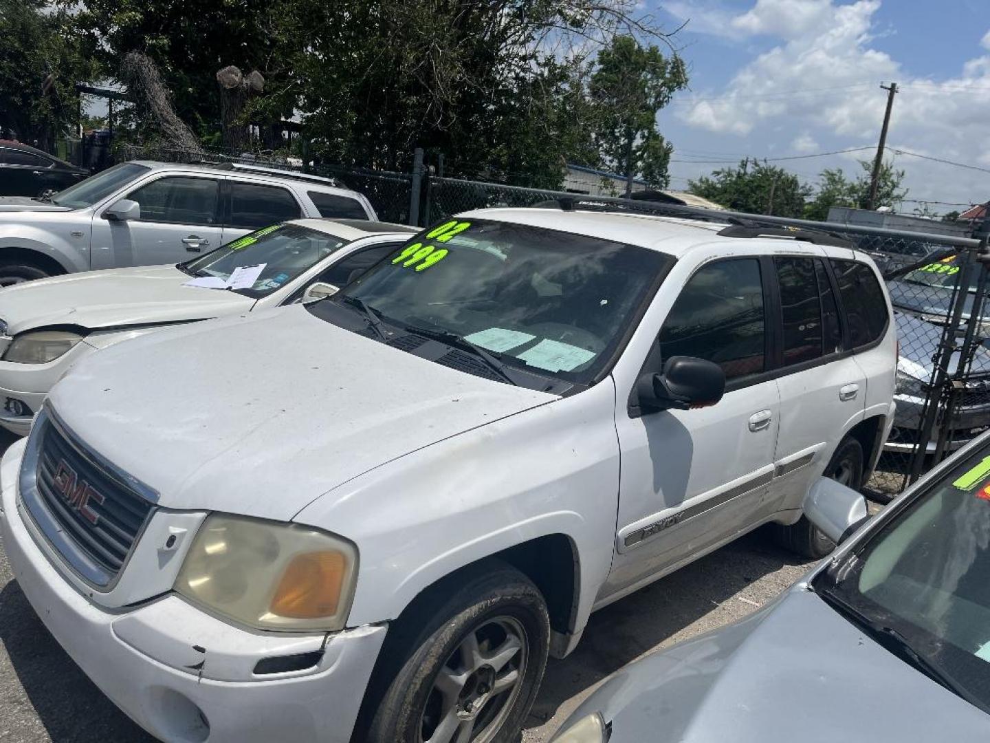 2002 WHITE GMC ENVOY SLE 2WD (1GKDS13S922) with an 4.2L L6 DOHC 24V engine, AUTOMATIC transmission, located at 2303 West Mt. Houston, Houston, 77038, (281) 507-3956, 29.771597, -95.339569 - Photo#1