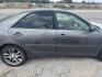 2005 GRAY TOYOTA CAMRY LE (4T1BE32K45U) with an 2.4L L4 DOHC 16V engine, AUTOMATIC transmission, located at 2303 West Mt. Houston, Houston, 77038, (281) 507-3956, 29.771597, -95.339569 - Photo#4