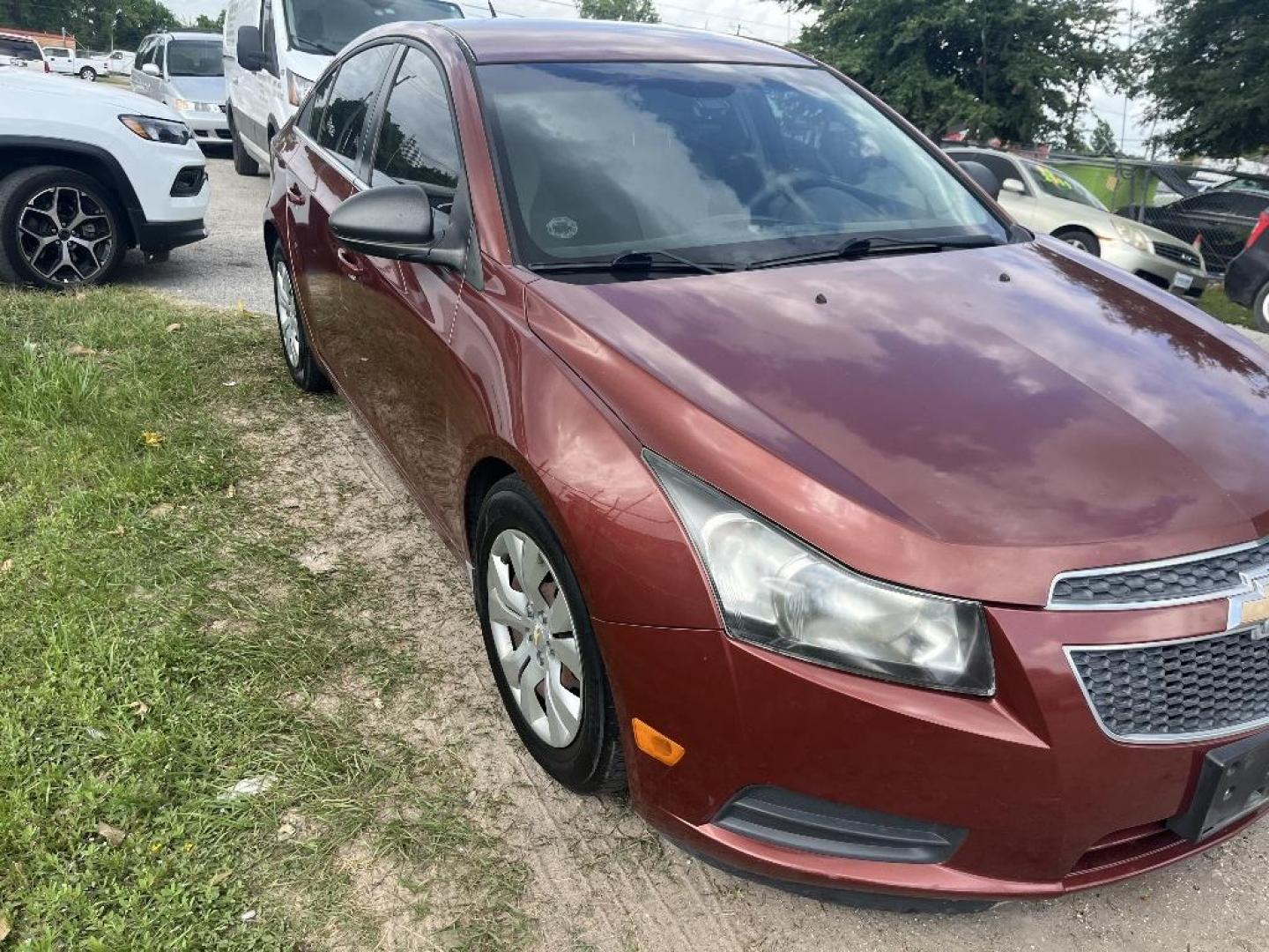 2012 BROWN CHEVROLET CRUZE 2LS (1G1PC5SH3C7) with an 1.8L L4 DOHC 16V FFV engine, AUTOMATIC transmission, located at 2303 West Mt. Houston, Houston, 77038, (281) 507-3956, 29.771597, -95.339569 - Photo#0