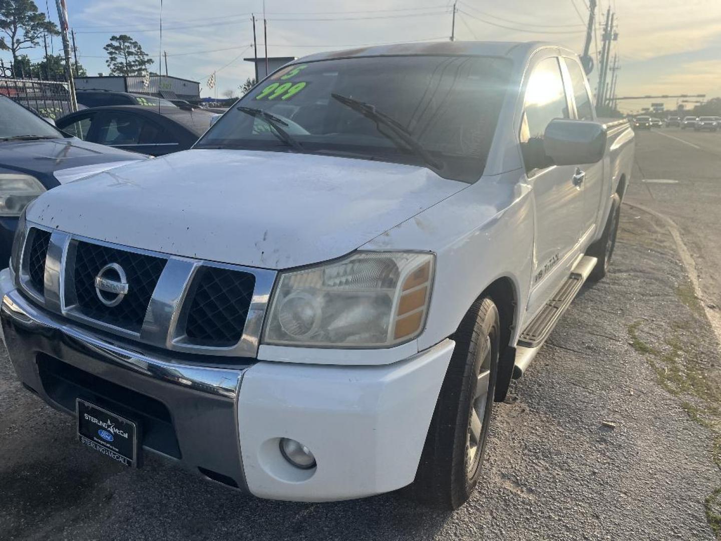 2005 WHITE NISSAN TITAN XE King Cab 2WD (1N6BA06A85N) with an 5.6L V8 DOHC 32V FFV engine, AUTOMATIC transmission, located at 2303 West Mt. Houston, Houston, 77038, (281) 507-3956, 29.771597, -95.339569 - Photo#0