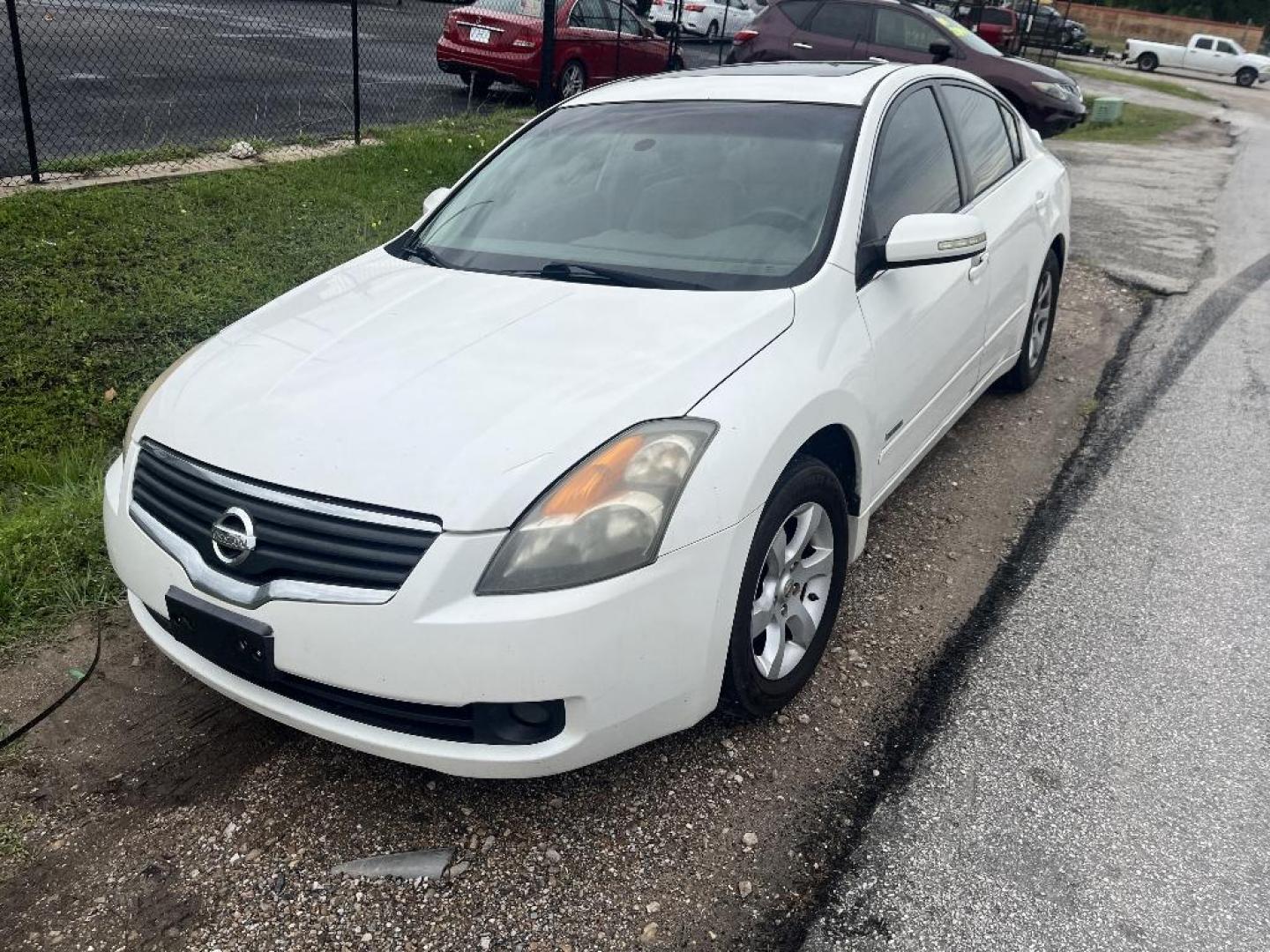 2008 WHITE NISSAN ALTIMA HYBRID HEV (1N4CL21E48C) with an 2.5L L4 DOHC 16V HYBRID engine, AUTOMATIC transmission, located at 2303 West Mt. Houston, Houston, 77038, (281) 507-3956, 29.771597, -95.339569 - Photo#0