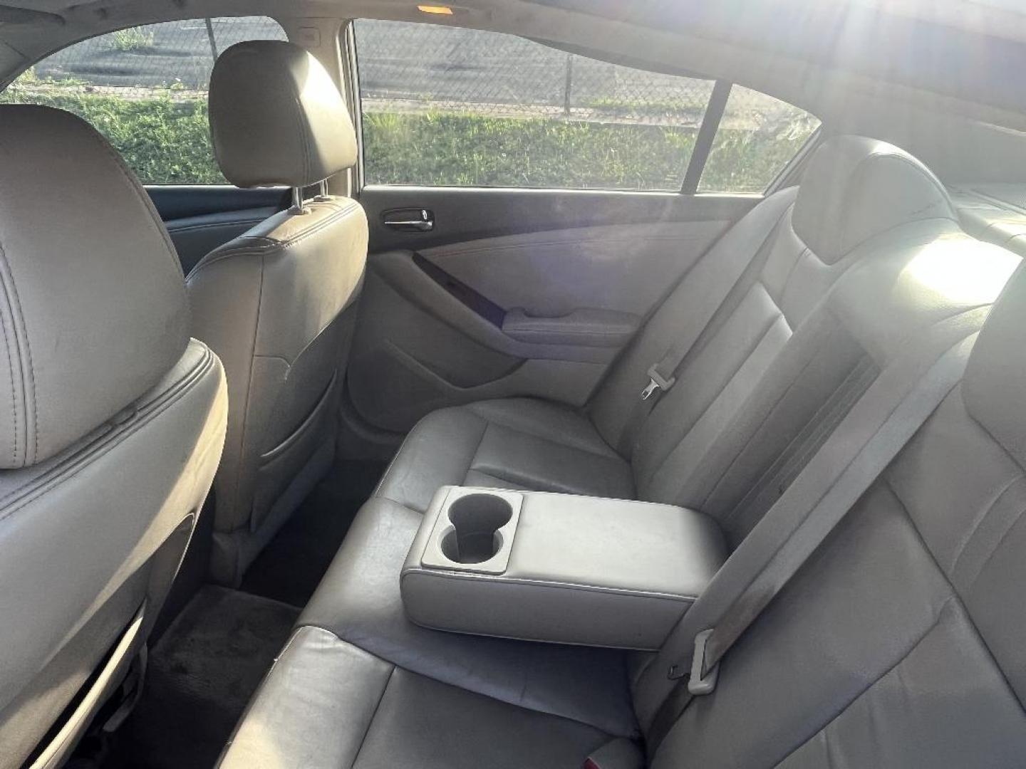 2008 WHITE NISSAN ALTIMA HYBRID HEV (1N4CL21E48C) with an 2.5L L4 DOHC 16V HYBRID engine, AUTOMATIC transmission, located at 2303 West Mt. Houston, Houston, 77038, (281) 507-3956, 29.771597, -95.339569 - Photo#6