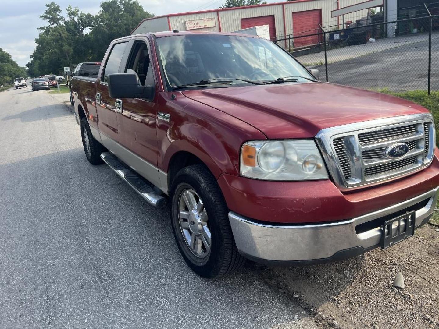2007 RED FORD F-150 Lariat SuperCrew 2WD (1FTRW12W07K) with an 4.6L V8 SOHC 16V engine, AUTOMATIC transmission, located at 2303 West Mt. Houston, Houston, 77038, (281) 507-3956, 29.771597, -95.339569 - Photo#1