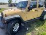 2014 BROWN JEEP WRANGLER Unlimited Sport 4WD (1C4BJWDG0EL) with an 3.6L V6 DOHC 24V FFV engine, MANUAL transmission, located at 2303 West Mt. Houston, Houston, 77038, (281) 507-3956, 29.771597, -95.339569 - Photo#0