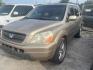 2005 BROWN HONDA PILOT LX (2HKYF18165H) with an 3.5L V6 SOHC 24V engine, AUTOMATIC transmission, located at 2303 West Mt. Houston, Houston, 77038, (281) 507-3956, 29.771597, -95.339569 - Photo#0