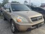 2005 BROWN HONDA PILOT LX (2HKYF18165H) with an 3.5L V6 SOHC 24V engine, AUTOMATIC transmission, located at 2303 West Mt. Houston, Houston, 77038, (281) 507-3956, 29.771597, -95.339569 - Photo#1