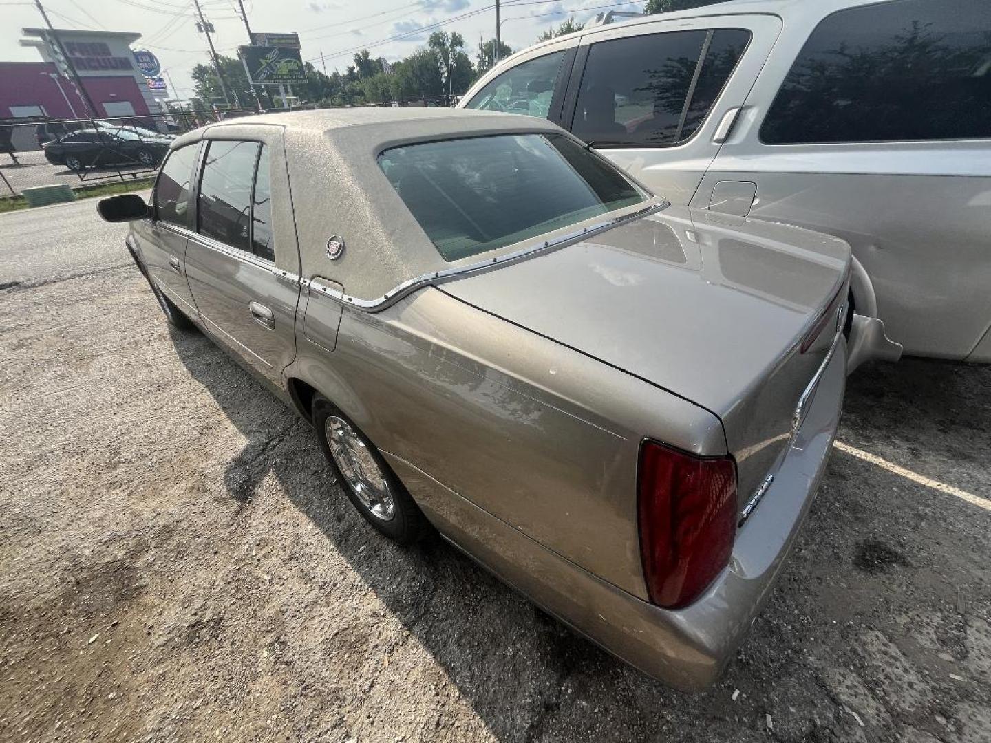 2002 TAN CADILLAC DEVILLE DHS (1G6KE54Y02U) with an 4.6L V8 DOHC 32V engine, AUTOMATIC transmission, located at 2303 West Mt. Houston, Houston, 77038, (281) 507-3956, 29.771597, -95.339569 - Photo#2