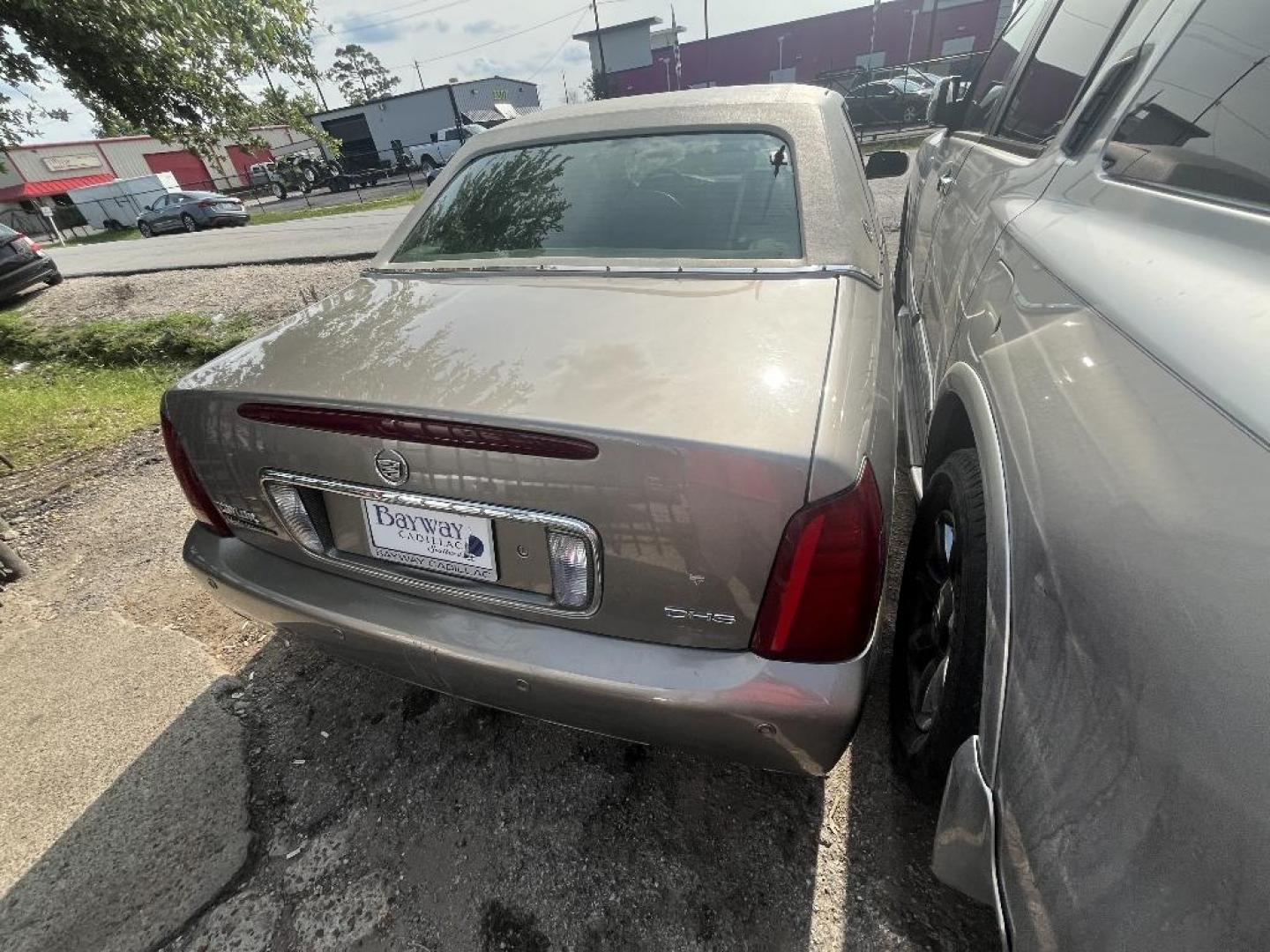 2002 TAN CADILLAC DEVILLE DHS (1G6KE54Y02U) with an 4.6L V8 DOHC 32V engine, AUTOMATIC transmission, located at 2303 West Mt. Houston, Houston, 77038, (281) 507-3956, 29.771597, -95.339569 - Photo#6