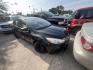 2015 BLACK /BLACK FORD FOCUS S Sedan (1FADP3E21FL) with an 2.0L L4 DOHC 16V engine, AUTOMATIC transmission, located at 2303 West Mt. Houston, Houston, 77038, (281) 507-3956, 29.771597, -95.339569 - Photo#0