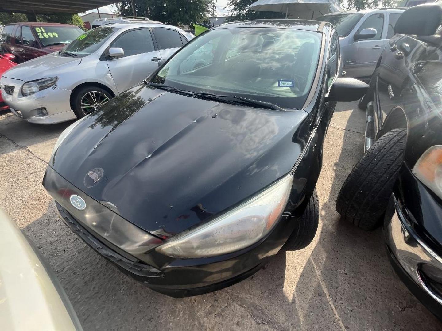 2015 BLACK /BLACK FORD FOCUS S Sedan (1FADP3E21FL) with an 2.0L L4 DOHC 16V engine, AUTOMATIC transmission, located at 2303 West Mt. Houston, Houston, 77038, (281) 507-3956, 29.771597, -95.339569 - Photo#1