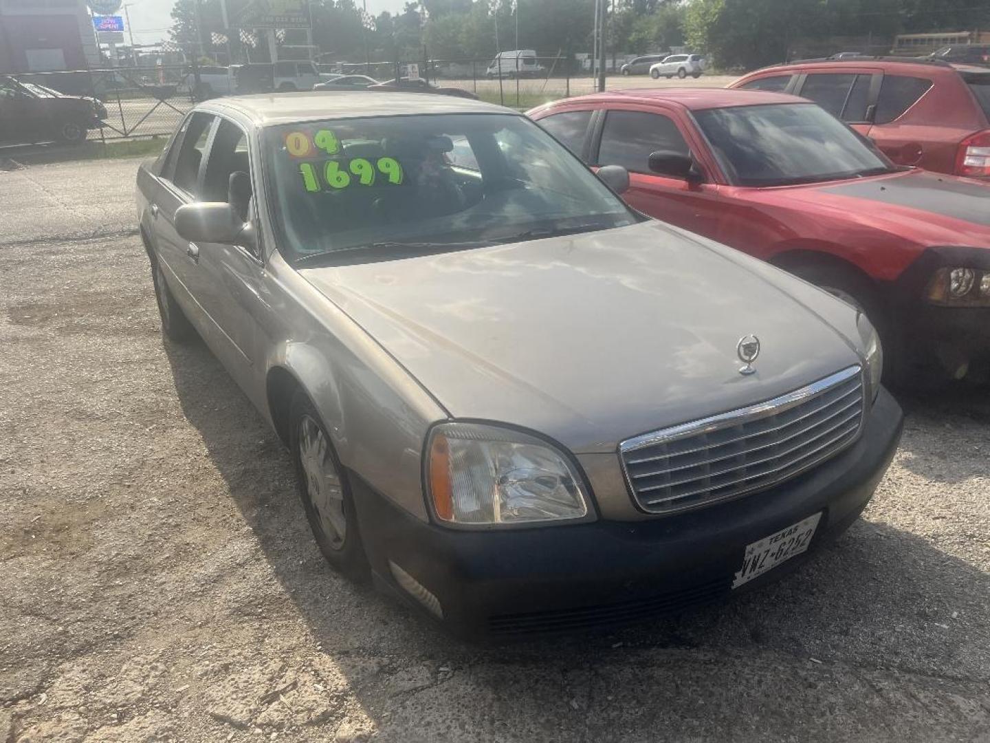 2004 BROWN CADILLAC DEVILLE Sedan (1G6KD54Y24U) with an 4.6L V8 DOHC 32V engine, AUTOMATIC transmission, located at 2303 West Mt. Houston, Houston, 77038, (281) 507-3956, 29.771597, -95.339569 - Photo#0