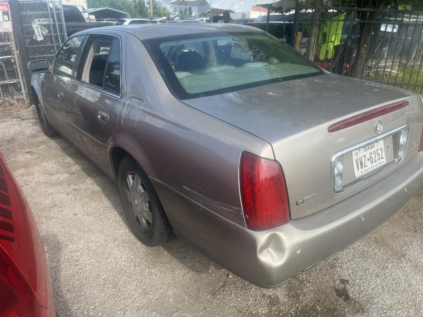 2004 BROWN CADILLAC DEVILLE Sedan (1G6KD54Y24U) with an 4.6L V8 DOHC 32V engine, AUTOMATIC transmission, located at 2303 West Mt. Houston, Houston, 77038, (281) 507-3956, 29.771597, -95.339569 - Photo#1