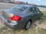 2005 GRAY INFINITI G35 Sedan x AWD (JNKCV51F65M) with an 3.5L V6 DOHC 24V engine, AUTOMATIC transmission, located at 2303 West Mt. Houston, Houston, 77038, (281) 507-3956, 29.771597, -95.339569 - Photo#6