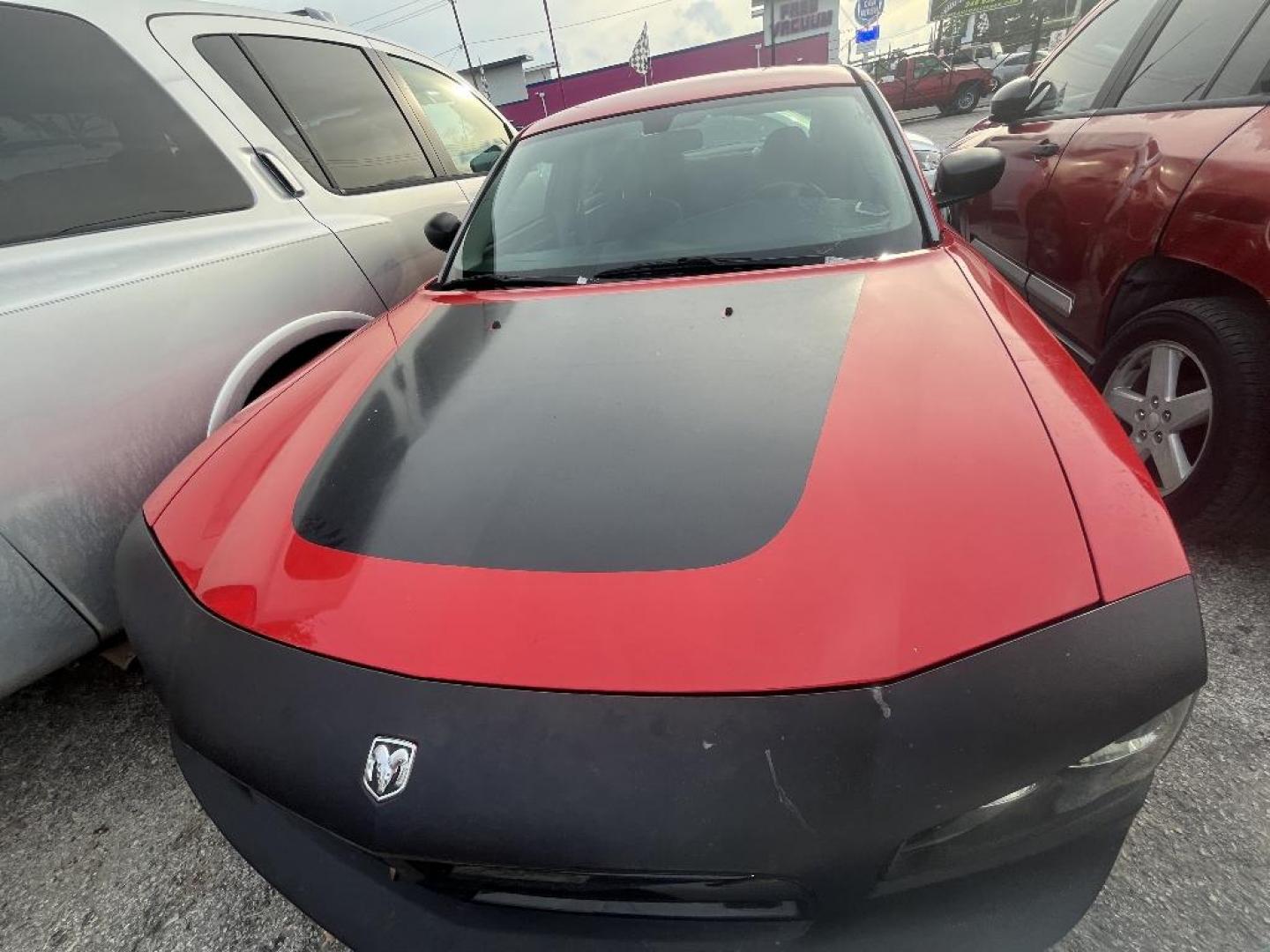 2007 RED DODGE CHARGER SXT (2B3KA43G77H) with an 3.5L V6 SOHC 24V engine, AUTOMATIC transmission, located at 2303 West Mt. Houston, Houston, 77038, (281) 507-3956, 29.771597, -95.339569 - Photo#0