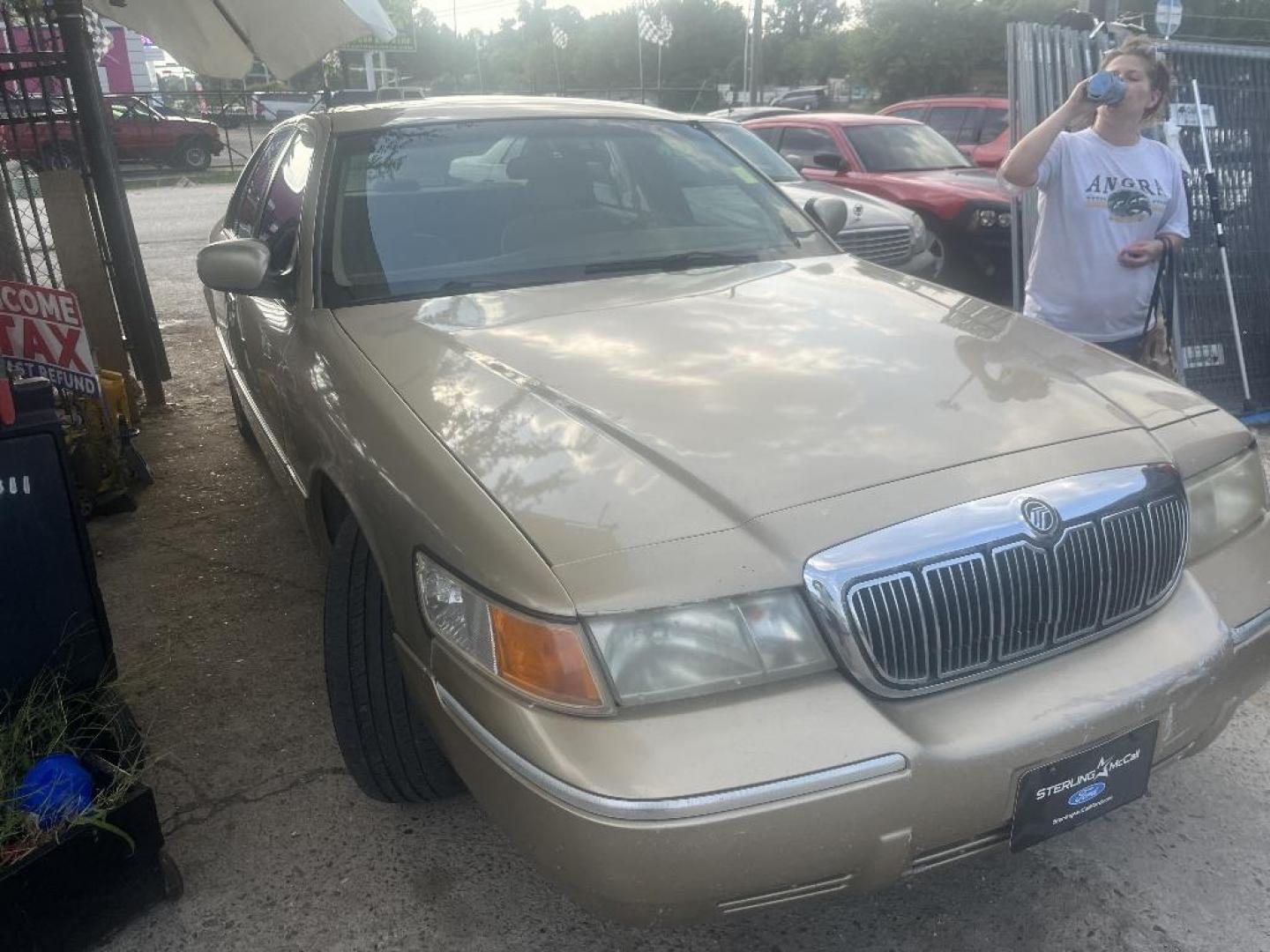 2000 BROWN MERCURY GRAND MARQUIS LS (2MEFM75W5YX) with an 4.6L V8 SOHC 16V engine, AUTOMATIC transmission, located at 2303 West Mt. Houston, Houston, 77038, (281) 507-3956, 29.771597, -95.339569 - Photo#0