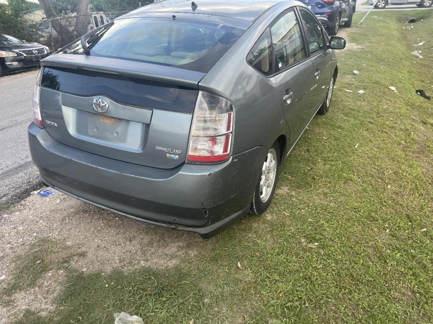 2005 BROWN TOYOTA PRIUS 4-Door Liftback (JTDKB20U053) with an 1.5L L4 DOHC 16V HYBRID engine, AUTOMATIC transmission, located at 2303 West Mt. Houston, Houston, 77038, (281) 507-3956, 29.771597, -95.339569 - Photo#1