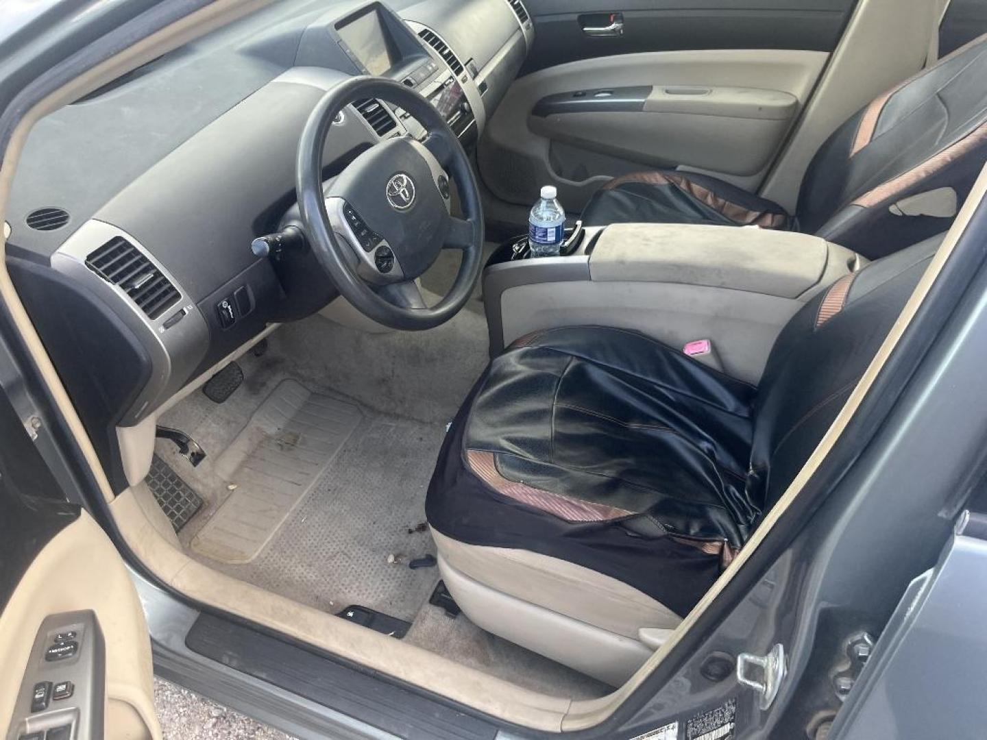 2005 BROWN TOYOTA PRIUS 4-Door Liftback (JTDKB20U053) with an 1.5L L4 DOHC 16V HYBRID engine, AUTOMATIC transmission, located at 2303 West Mt. Houston, Houston, 77038, (281) 507-3956, 29.771597, -95.339569 - Photo#3