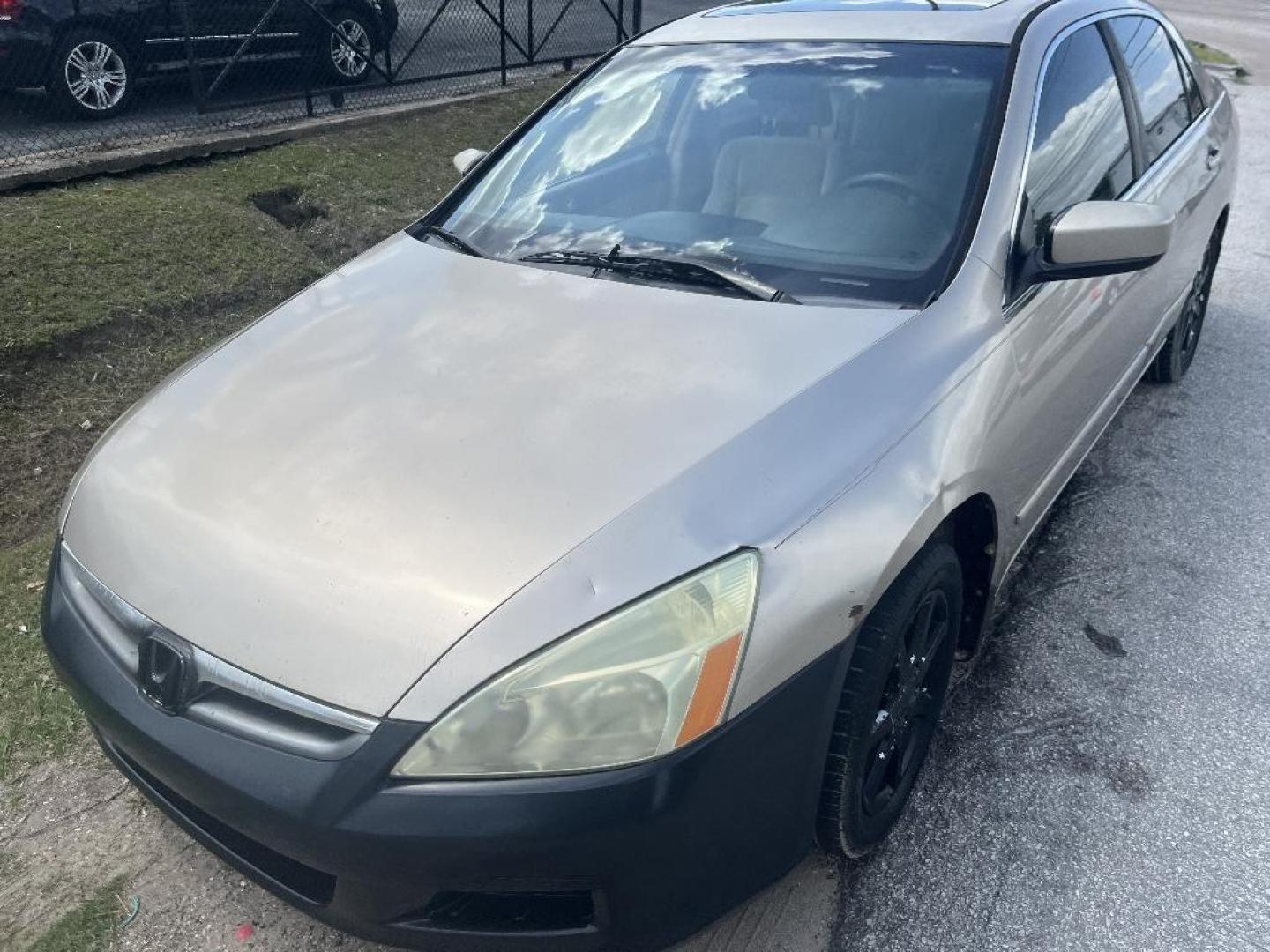 2006 BROWN HONDA ACCORD EX-L Sedan AT with Navigation and XM Radio (1HGCM56736A) with an 2.4L L4 DOHC 16V engine, AUTOMATIC transmission, located at 2303 West Mt. Houston, Houston, 77038, (281) 507-3956, 29.771597, -95.339569 - Photo#0