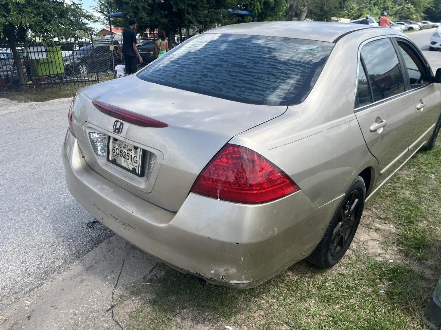 2006 BROWN HONDA ACCORD EX-L Sedan AT with Navigation and XM Radio (1HGCM56736A) with an 2.4L L4 DOHC 16V engine, AUTOMATIC transmission, located at 2303 West Mt. Houston, Houston, 77038, (281) 507-3956, 29.771597, -95.339569 - Photo#1