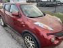 2012 RED NISSAN JUKE S FWD (JN8AF5MR3CT) with an 1.6L L4 DOHC 16V TURBO engine, AUTOMATIC transmission, located at 2303 West Mt. Houston, Houston, 77038, (281) 507-3956, 29.771597, -95.339569 - Photo#0