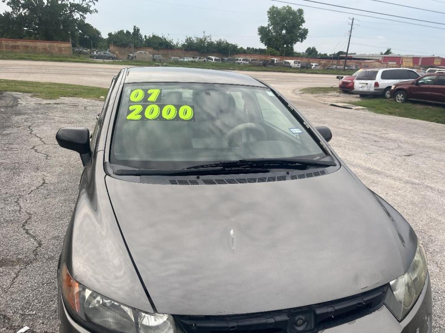 2007 BROWN HONDA CIVIC LX Sedan AT (2HGFA16527H) with an 1.8L L4 SOHC 16V engine, AUTOMATIC transmission, located at 2303 West Mt. Houston, Houston, 77038, (281) 507-3956, 29.771597, -95.339569 - Photo#0