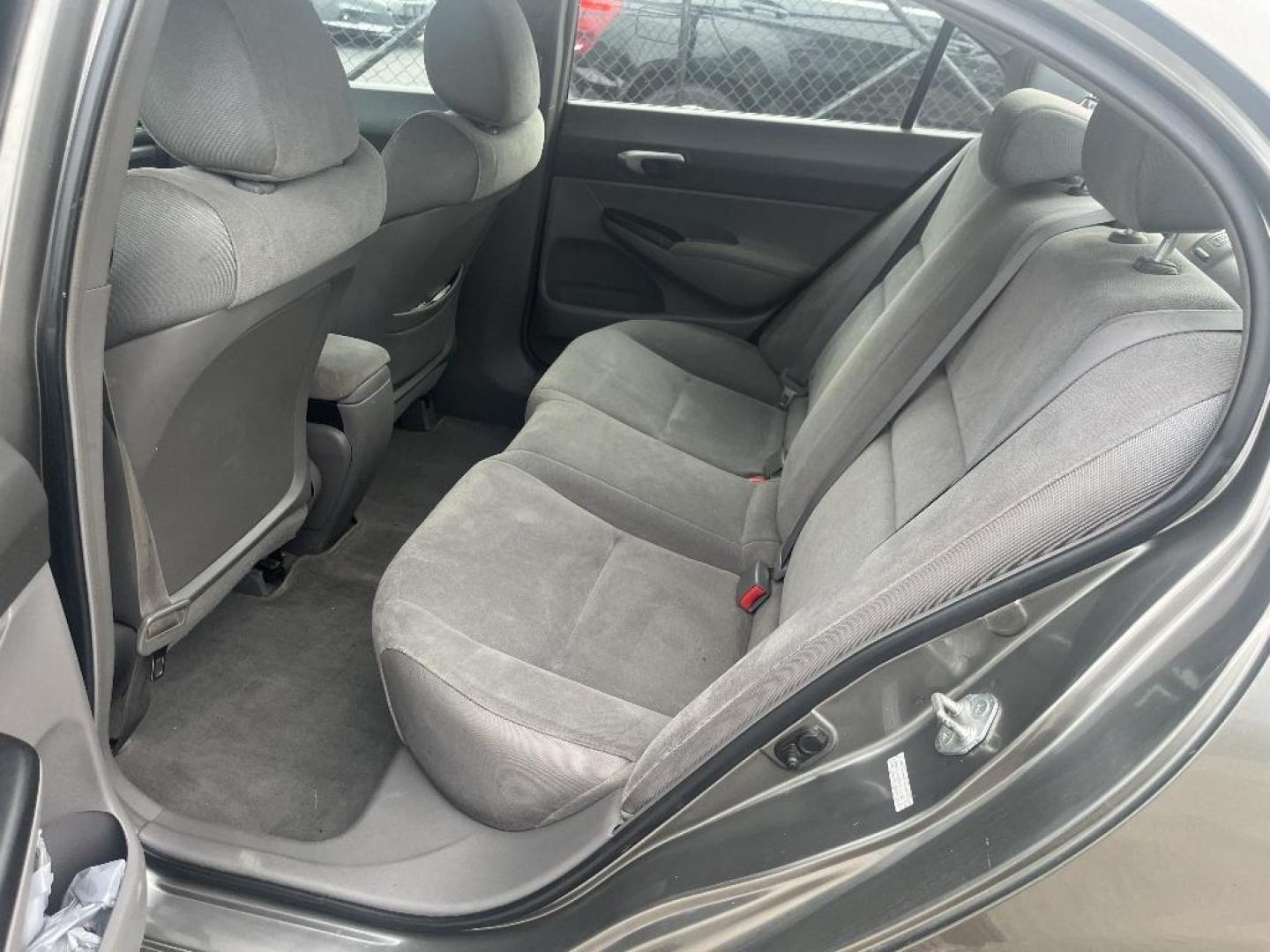 2007 BROWN HONDA CIVIC LX Sedan AT (2HGFA16527H) with an 1.8L L4 SOHC 16V engine, AUTOMATIC transmission, located at 2303 West Mt. Houston, Houston, 77038, (281) 507-3956, 29.771597, -95.339569 - Photo#2