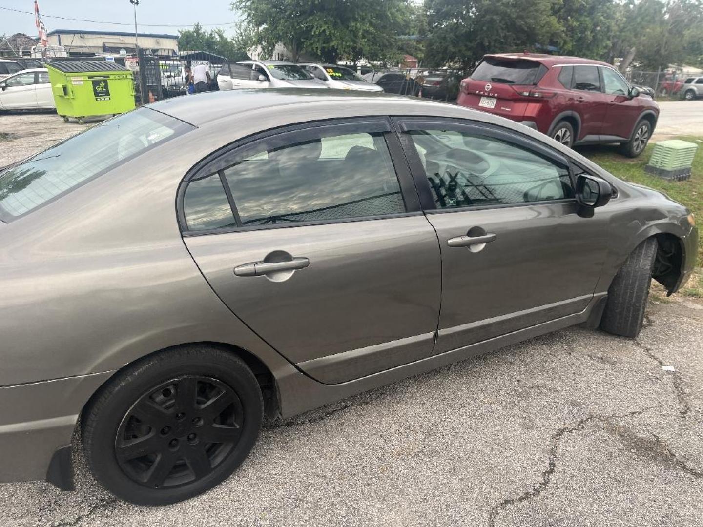 2007 BROWN HONDA CIVIC LX Sedan AT (2HGFA16527H) with an 1.8L L4 SOHC 16V engine, AUTOMATIC transmission, located at 2303 West Mt. Houston, Houston, 77038, (281) 507-3956, 29.771597, -95.339569 - Photo#3