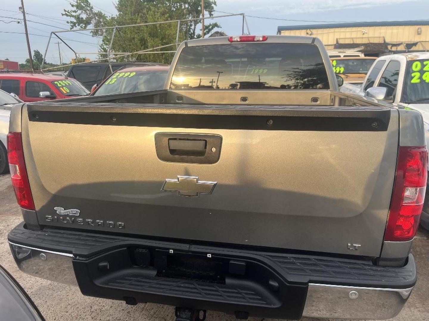 2009 BROWN CHEVROLET SILVERADO 1500 LT1 Ext. Cab Long Box 2WD (1GCEC29J79Z) with an 5.3L V8 OHV 16V engine, AUTOMATIC transmission, located at 2303 West Mt. Houston, Houston, 77038, (281) 507-3956, 29.771597, -95.339569 - Photo#3