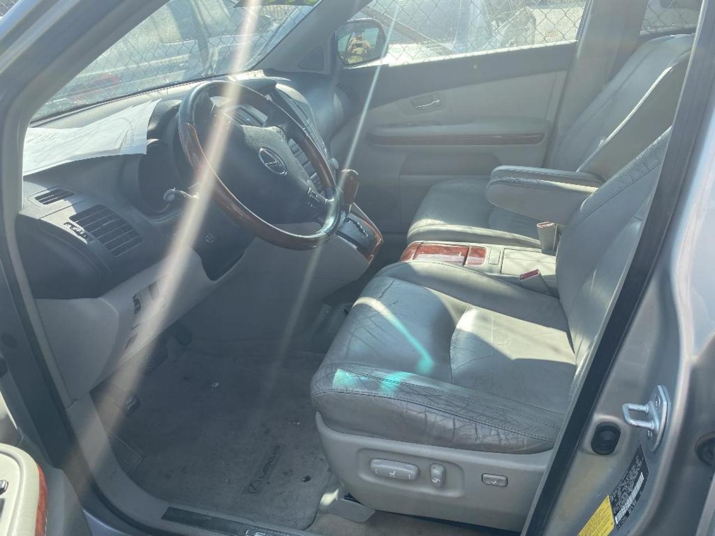2008 SILVER LEXUS RX 400H FWD (JTJGW31UX82) with an 3.3L V6 DOHC 24V HYBRID engine, AUTOMATIC transmission, located at 2303 West Mt. Houston, Houston, 77038, (281) 507-3956, 29.771597, -95.339569 - Photo#1