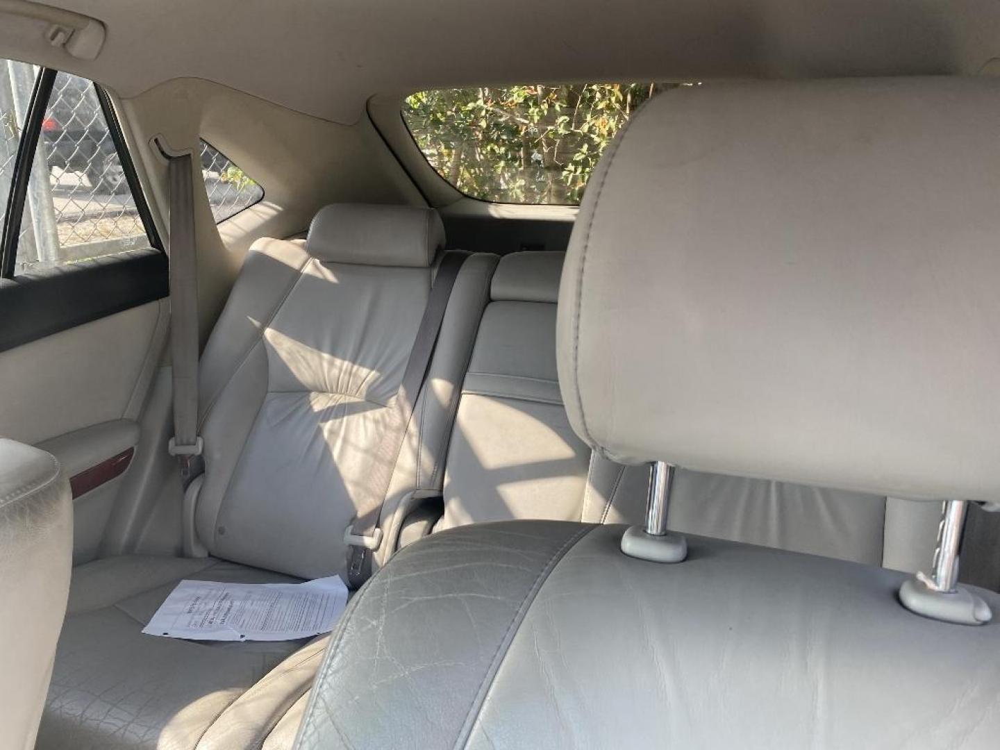 2008 SILVER LEXUS RX 400H FWD (JTJGW31UX82) with an 3.3L V6 DOHC 24V HYBRID engine, AUTOMATIC transmission, located at 2303 West Mt. Houston, Houston, 77038, (281) 507-3956, 29.771597, -95.339569 - Photo#2