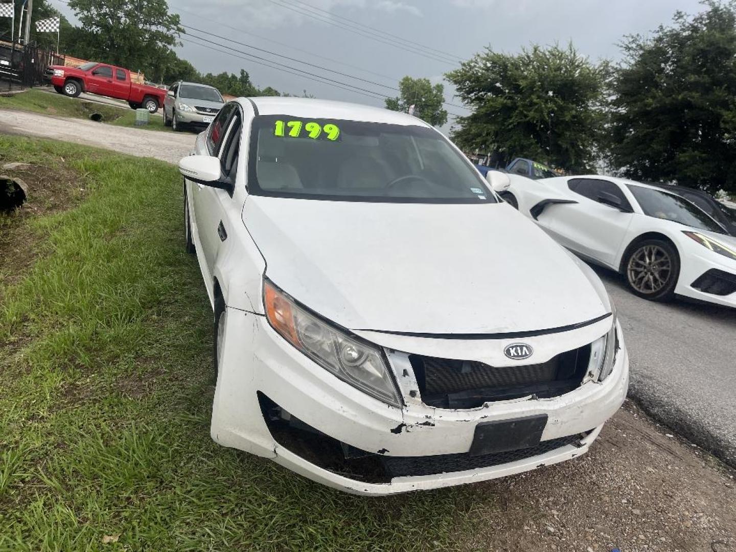 2011 WHITE KIA OPTIMA LX AT (KNAGM4A71B5) with an 2.4L L4 DOHC 16V engine, AUTOMATIC transmission, located at 2303 West Mt. Houston, Houston, 77038, (281) 507-3956, 29.771597, -95.339569 - Photo#0