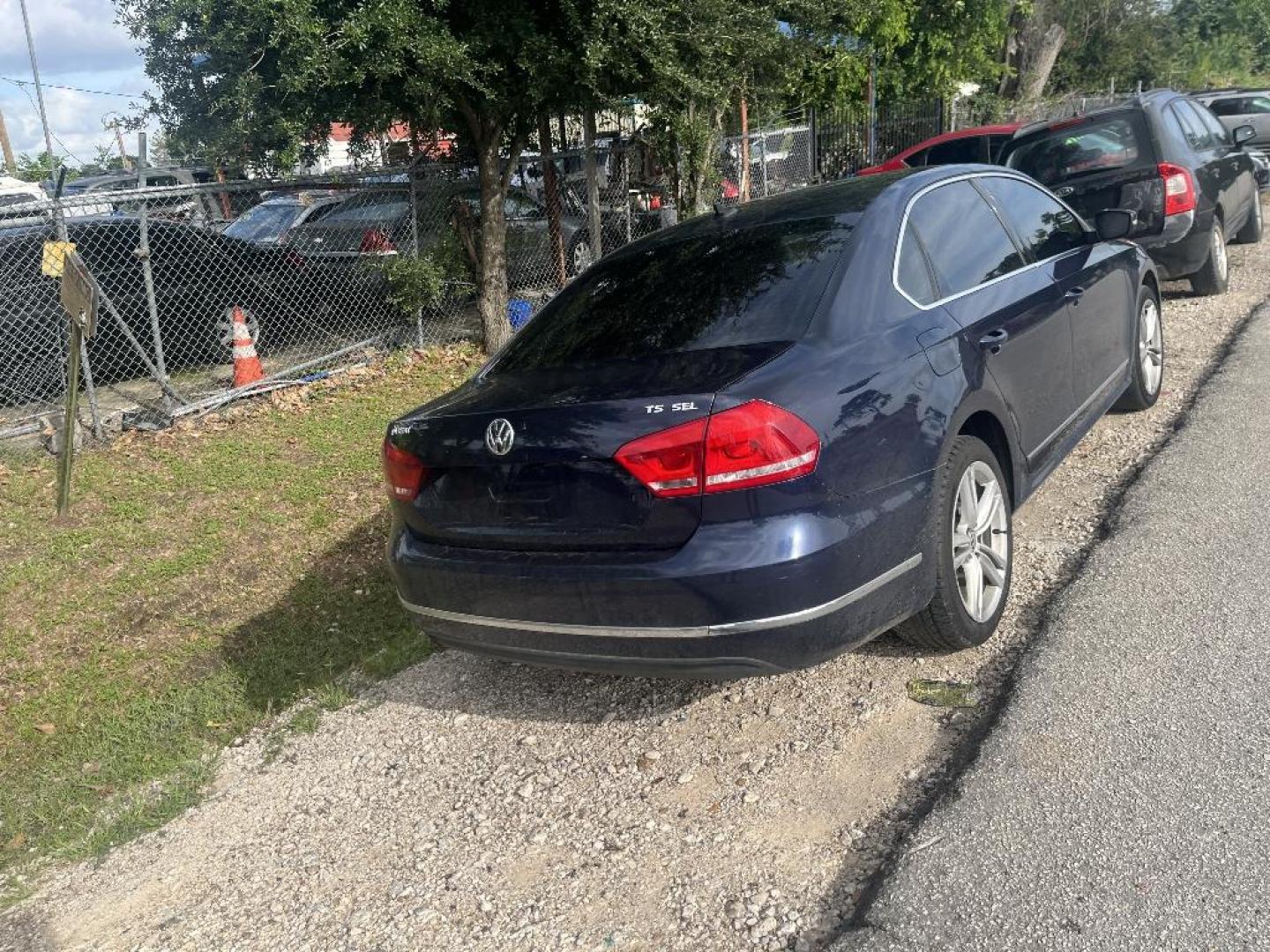 2014 BLUE VOLKSWAGEN PASSAT 1.8T SEL Premium AT (1VWCS7A35EC) with an 1.8L L4 engine, AUTOMATIC transmission, located at 2303 West Mt. Houston, Houston, 77038, (281) 507-3956, 29.771597, -95.339569 - Photo#2