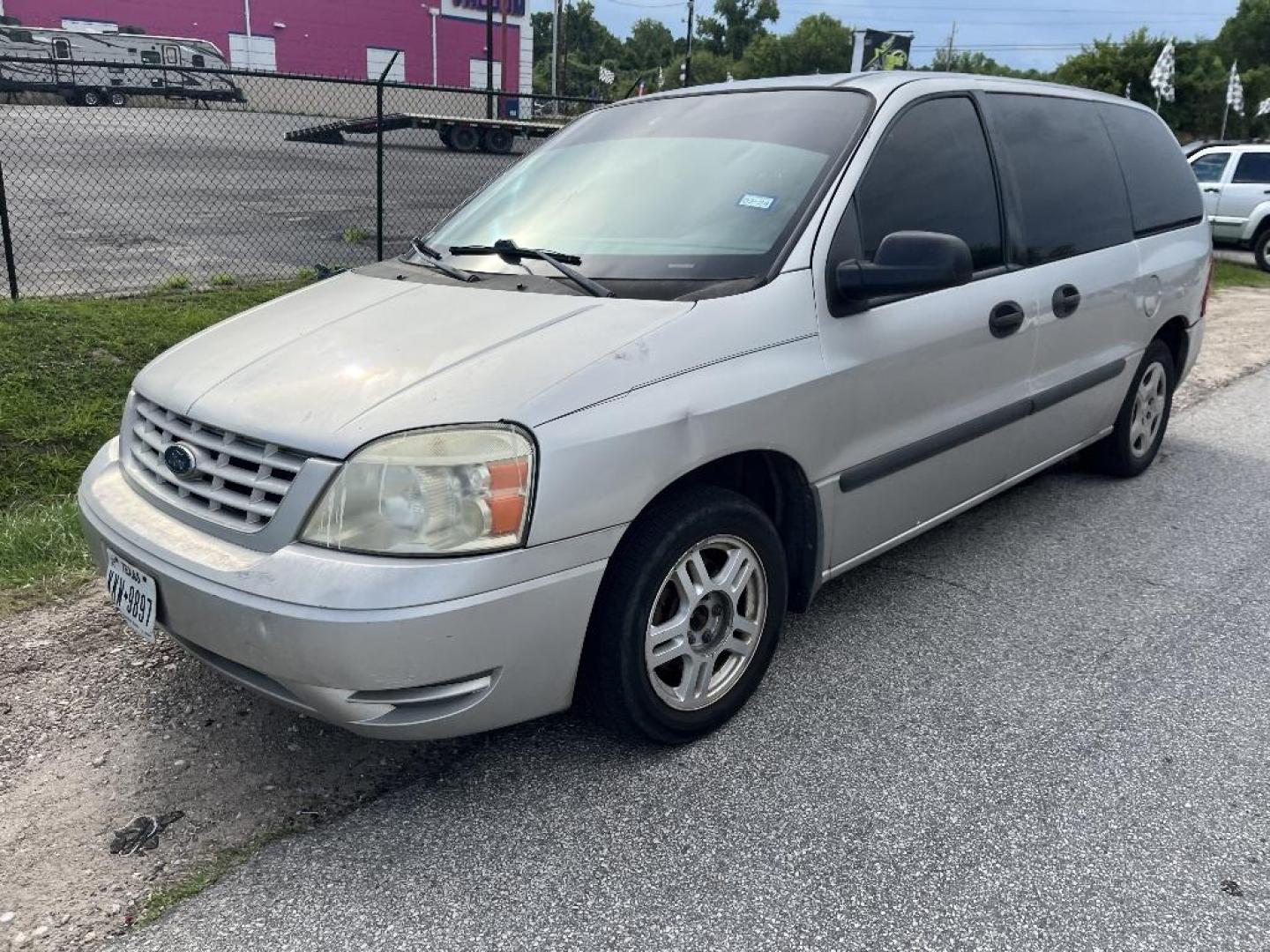 2004 GRAY FORD FREESTAR S (2FMZA50634B) with an 3.9L V6 OHV 12V engine, AUTOMATIC transmission, located at 2303 West Mt. Houston, Houston, 77038, (281) 507-3956, 29.771597, -95.339569 - Photo#0