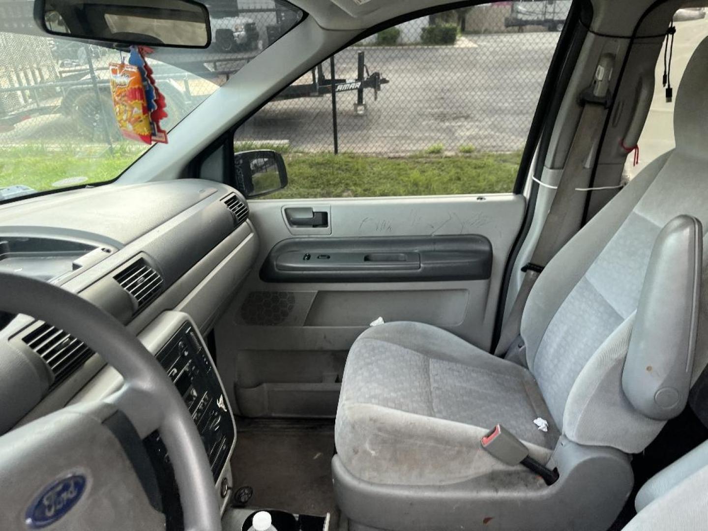 2004 GRAY FORD FREESTAR S (2FMZA50634B) with an 3.9L V6 OHV 12V engine, AUTOMATIC transmission, located at 2303 West Mt. Houston, Houston, 77038, (281) 507-3956, 29.771597, -95.339569 - Photo#3