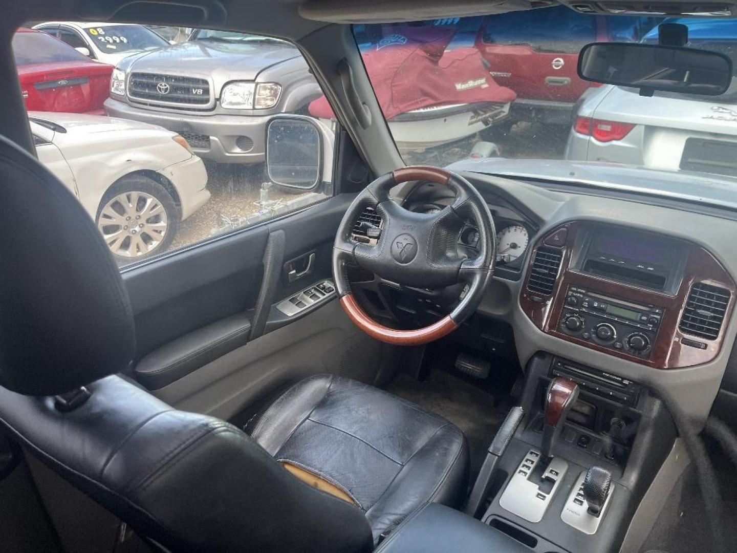 2006 GRAY MITSUBISHI MONTERO Limited 4WD (JA4MW51S66J) with an 3.8L V6 SOHC 24V engine, AUTOMATIC transmission, located at 2303 West Mt. Houston, Houston, 77038, (281) 507-3956, 29.771597, -95.339569 - Photo#5