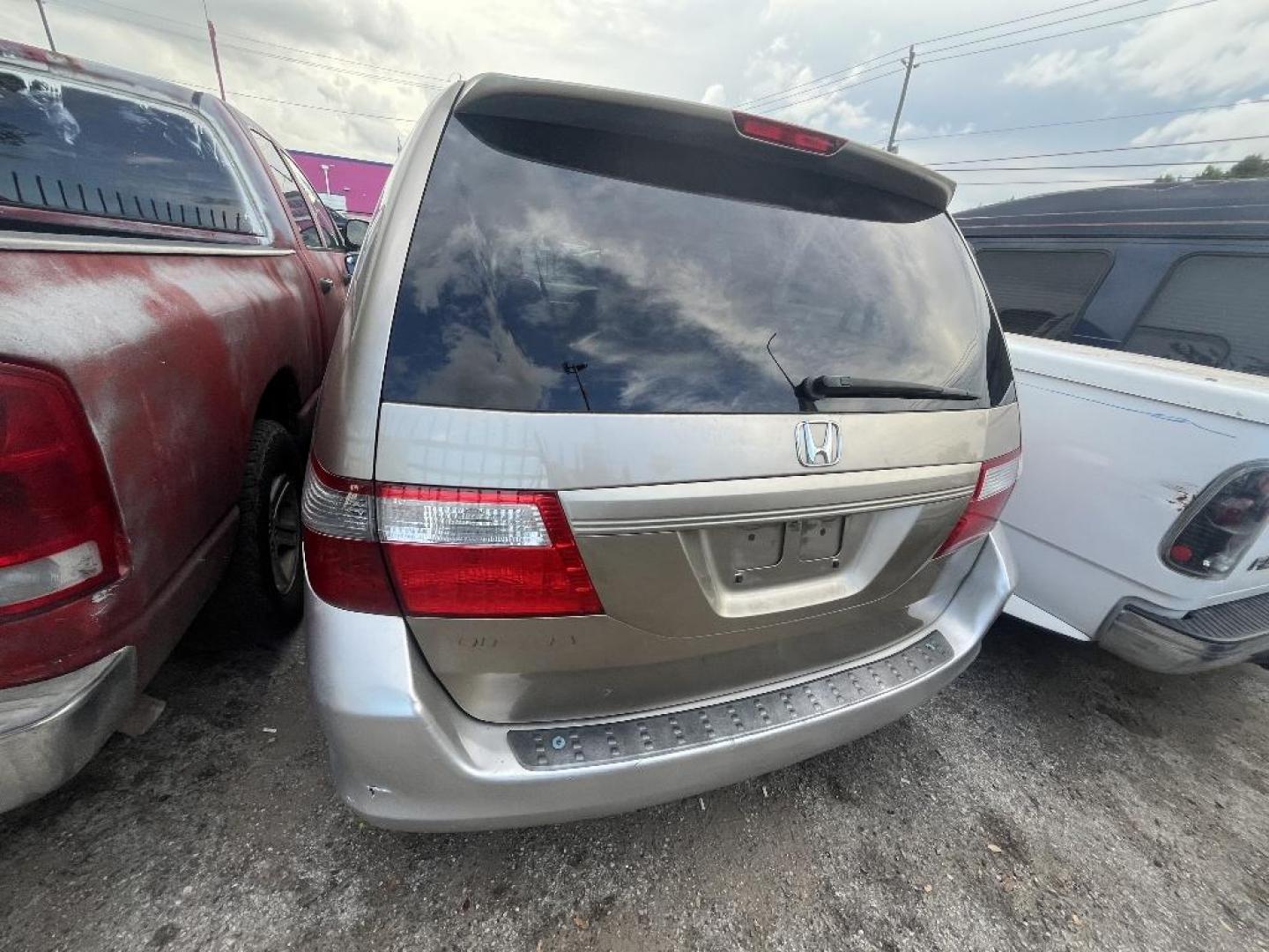 2007 BROWN HONDA ODYSSEY EX (5FNRL38417B) with an 3.5L V6 SOHC 24V engine, AUTOMATIC transmission, located at 2303 West Mt. Houston, Houston, 77038, (281) 507-3956, 29.771597, -95.339569 - Photo#1