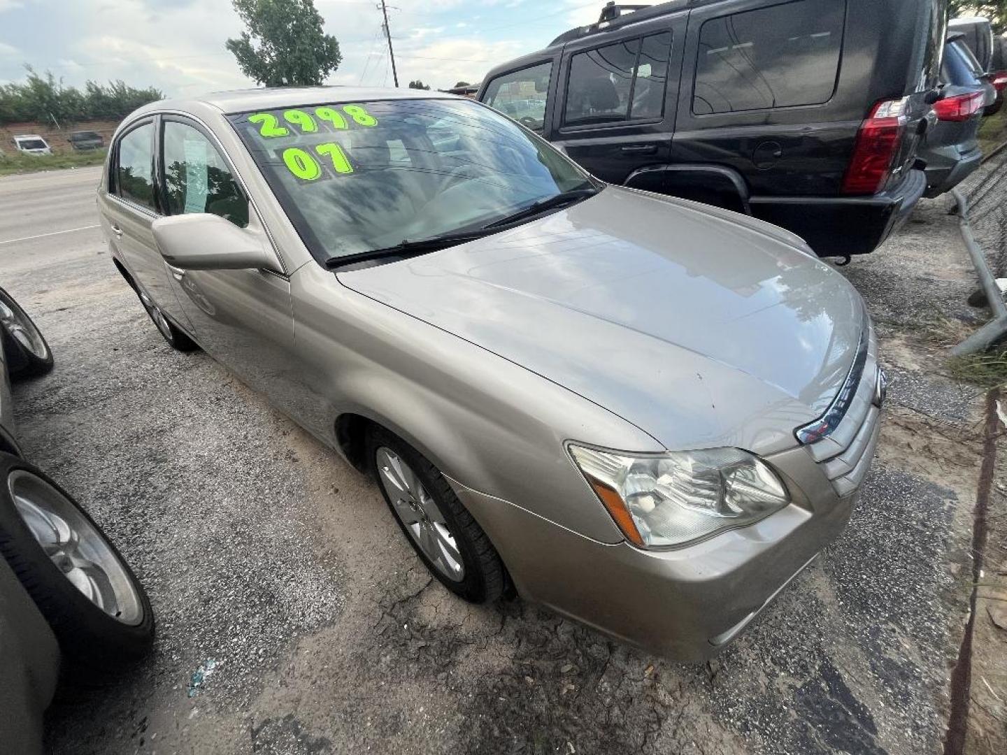 2007 BROWN TOYOTA AVALON Limited (4T1BK36B67U) with an 3.5L V6 DOHC 24V engine, AUTOMATIC transmission, located at 2303 West Mt. Houston, Houston, 77038, (281) 507-3956, 29.771597, -95.339569 - Photo#0
