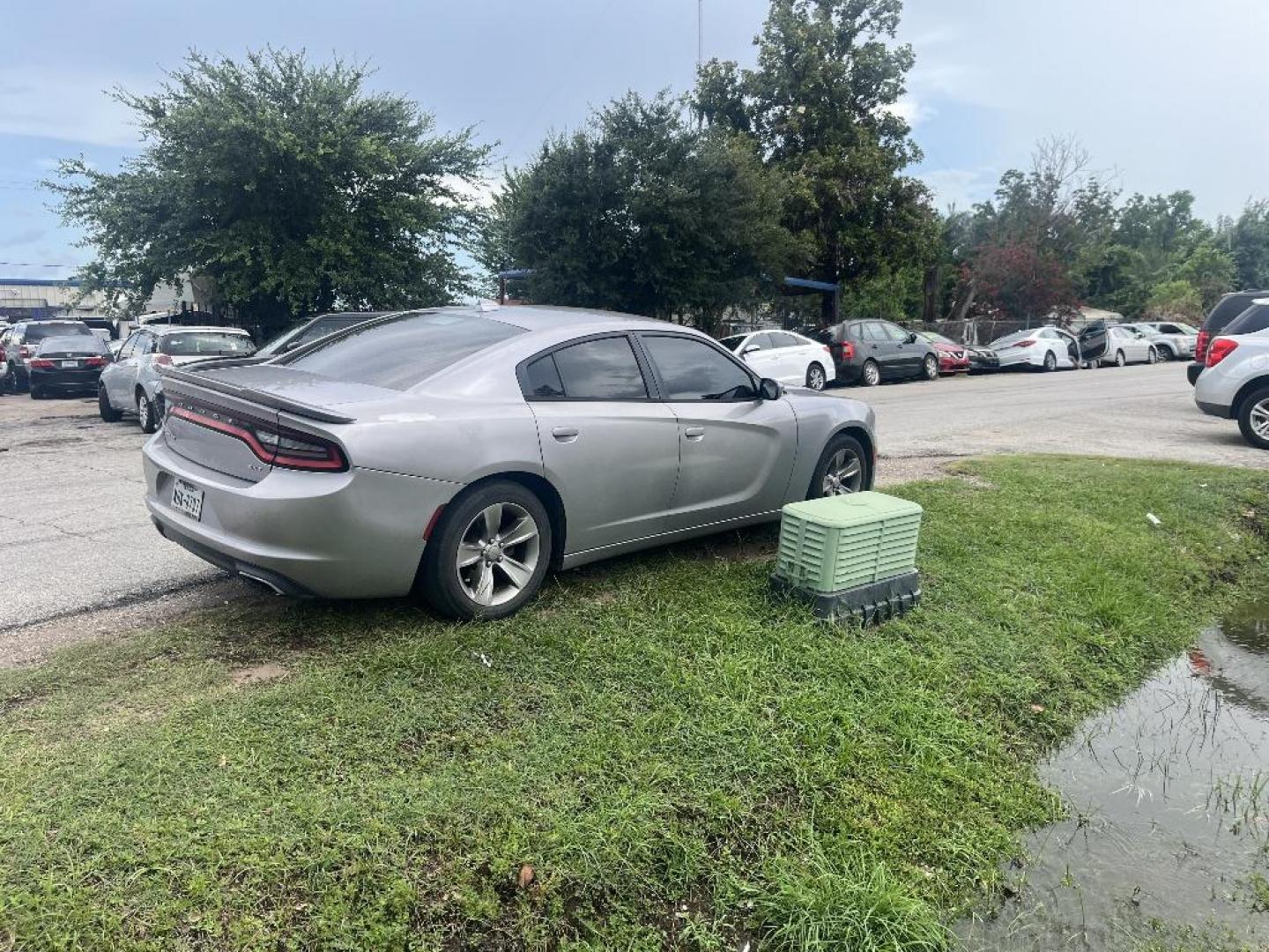 2016 GRAY DODGE CHARGER SXT (2C3CDXHG4GH) with an 3.6L V6 DOHC 24V engine, AUTOMATIC transmission, located at 2303 West Mt. Houston, Houston, 77038, (281) 507-3956, 29.771597, -95.339569 - Photo#2