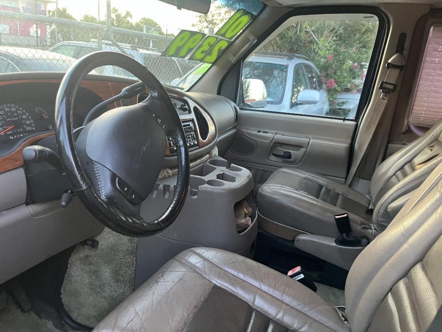 2001 GRAY FORD ECONOLINE E150 (1FDRE14W41H) with an 4.6L V8 SOHC 16V engine, AUTOMATIC transmission, located at 2303 West Mt. Houston, Houston, 77038, (281) 507-3956, 29.771597, -95.339569 - Photo#1