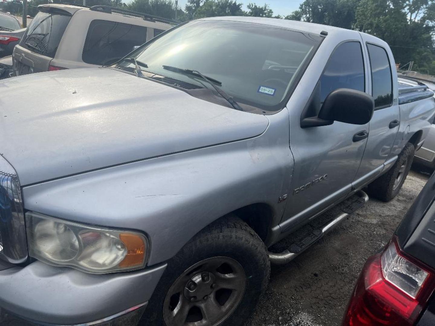 2002 BROWN DODGE RAM 1500 ST Quad Cab Short Bed 2WD (3D7HA18N92G) with an 4.7L V8 SOHC 16V engine, AUTOMATIC transmission, located at 2303 West Mt. Houston, Houston, 77038, (281) 507-3956, 29.771597, -95.339569 - Photo#0