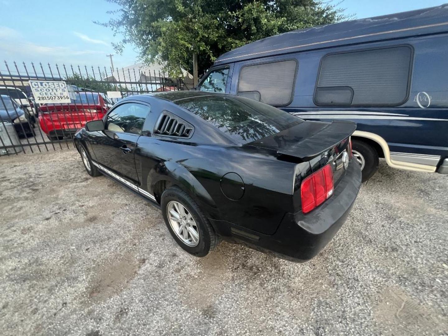 2008 BLACK FORD MUSTANG V6 Premium Coupe (1ZVHT80N585) with an 4.0L V6 SOHC 12V engine, AUTOMATIC transmission, located at 2303 West Mt. Houston, Houston, 77038, (281) 507-3956, 29.771597, -95.339569 - Photo#2